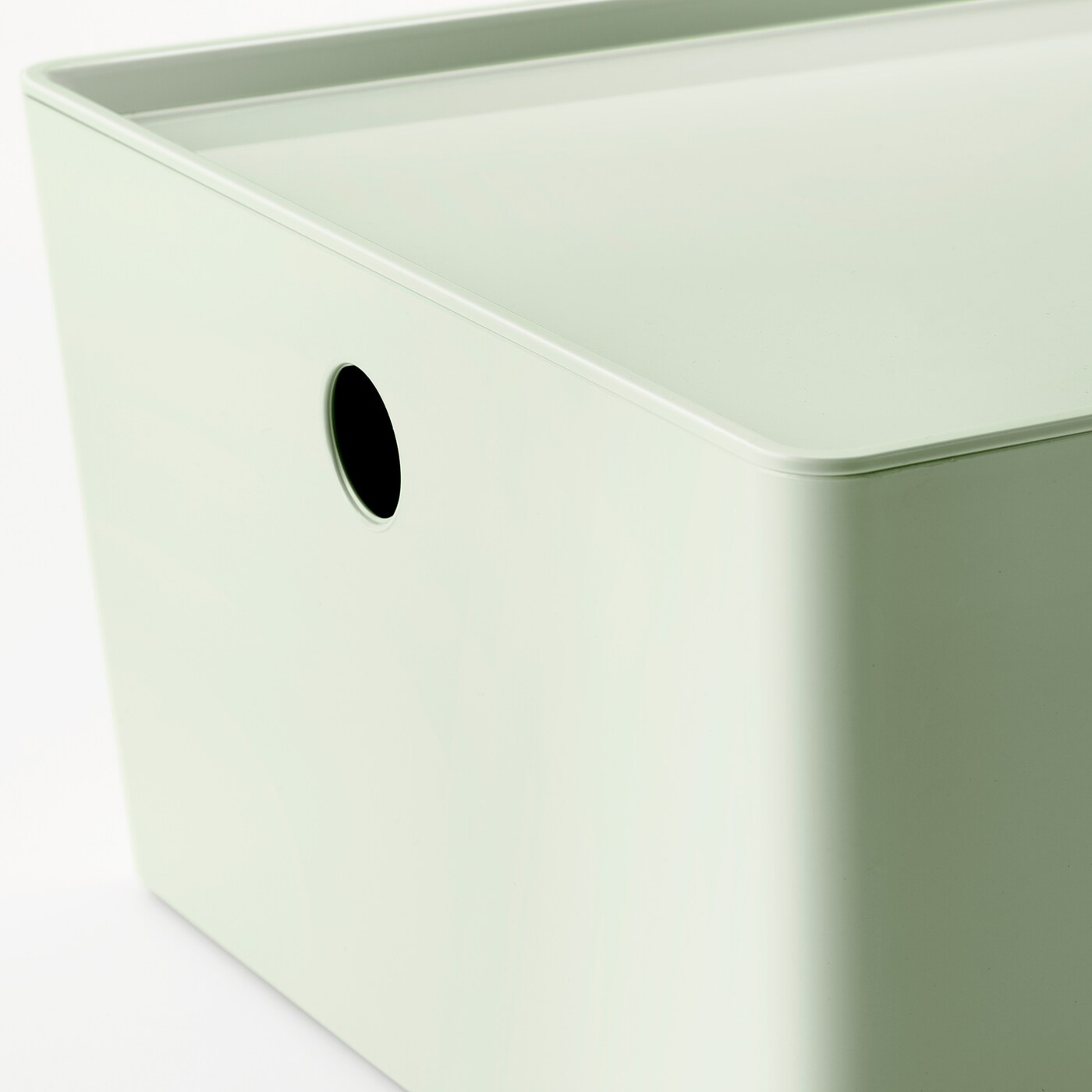 green plastic storage boxes with lids