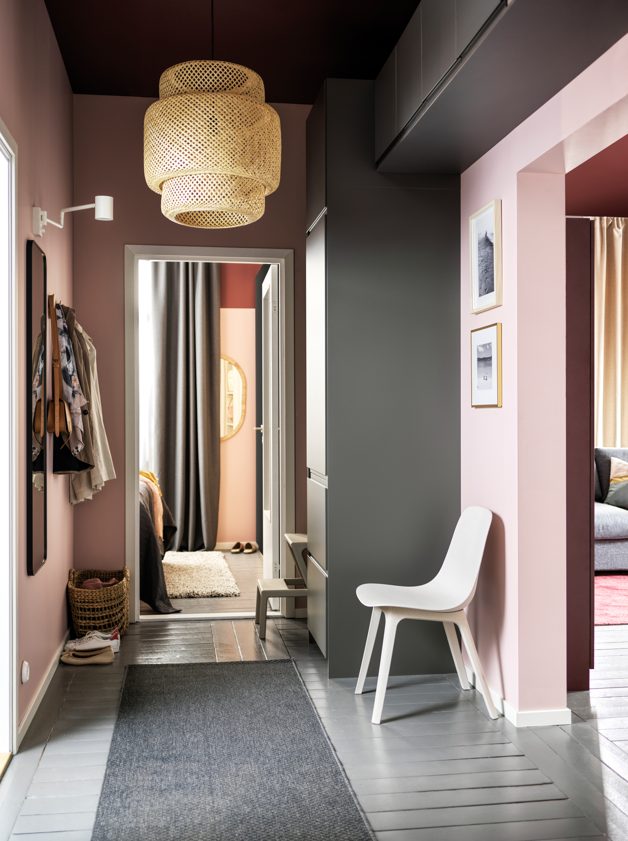 A hallway with a storage combination made from grey METOD cabinets with shelves and four drawers plus wall mounted cabinets.
