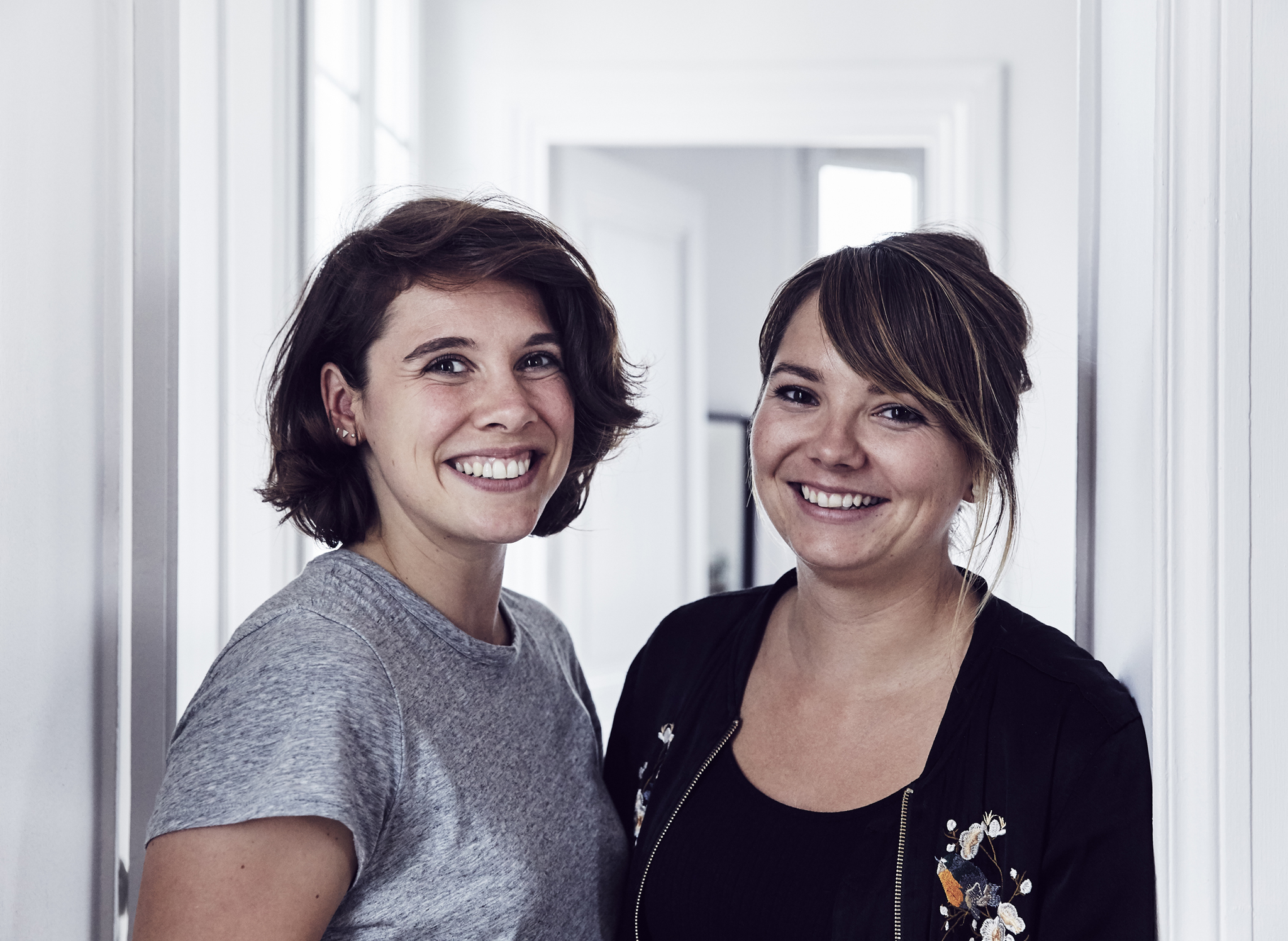 A portrait of homeowners Stephanie and Patricia.