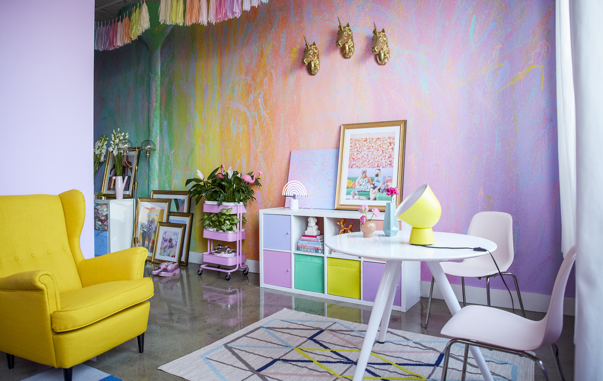 A rainbow living room and dining area.
