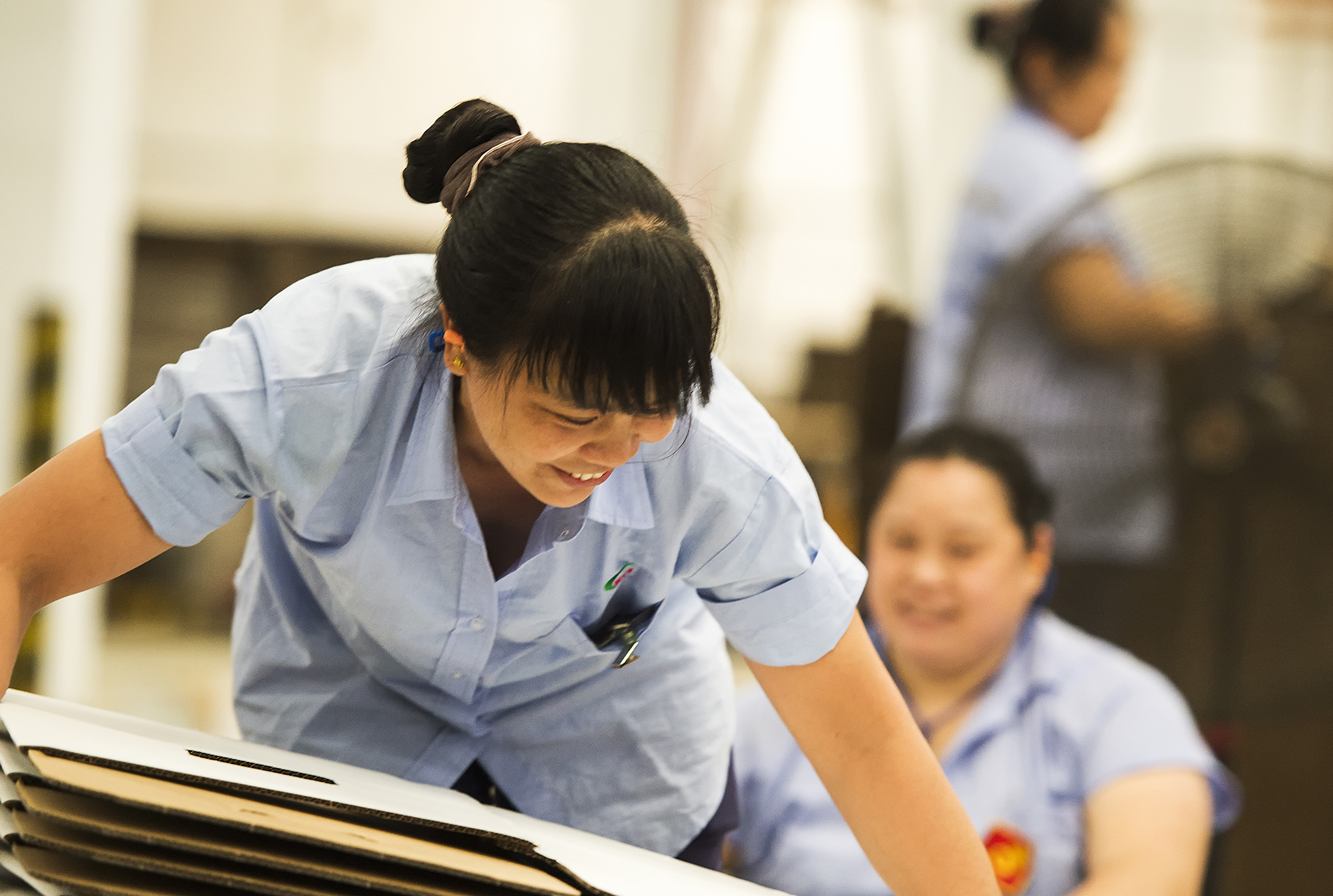 A woman working at an IKEA supplier.