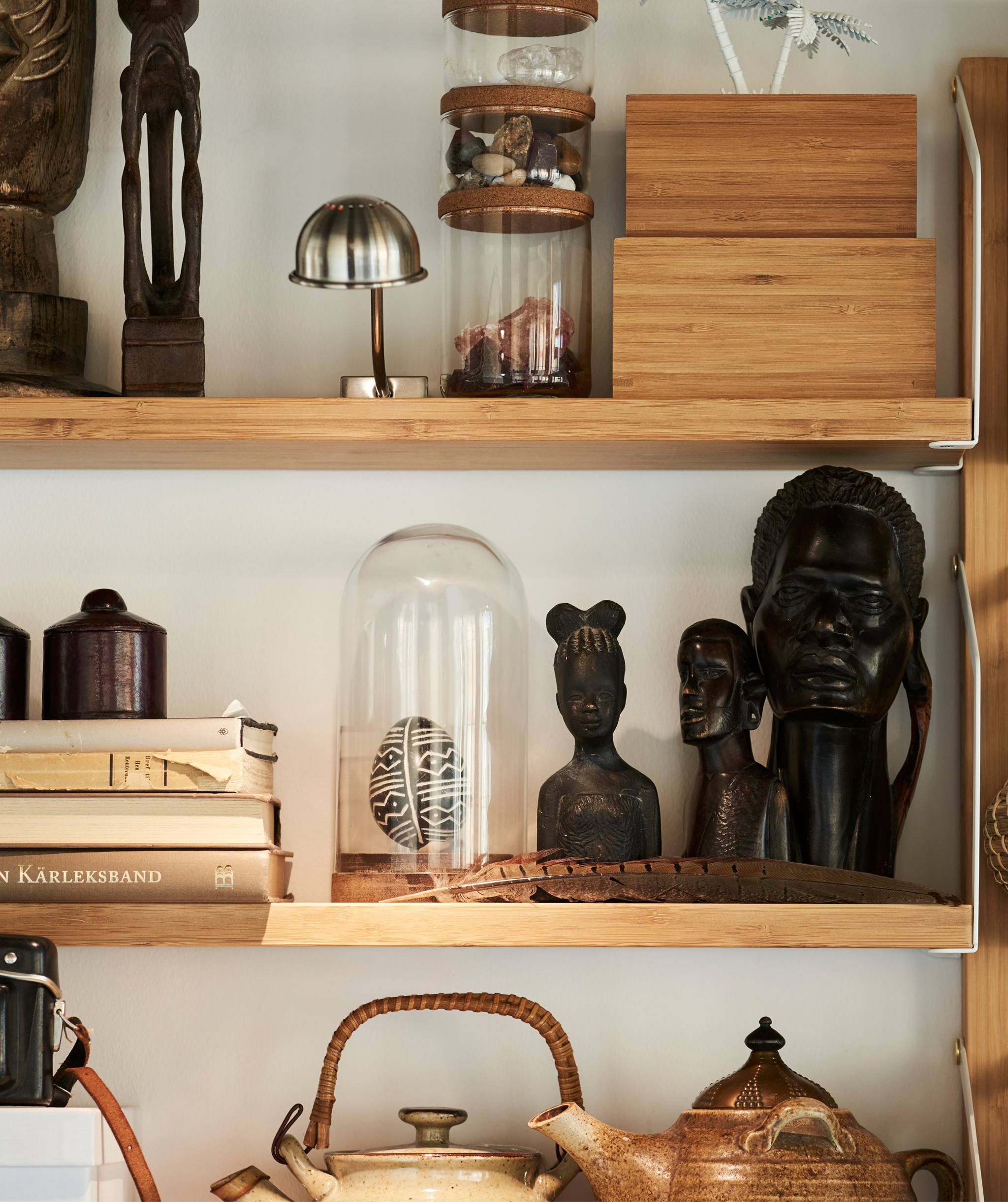 IKEA HÄRLIGA glass domes keep treasured collectibles free of dirt and dust, but also add a decorative touch.