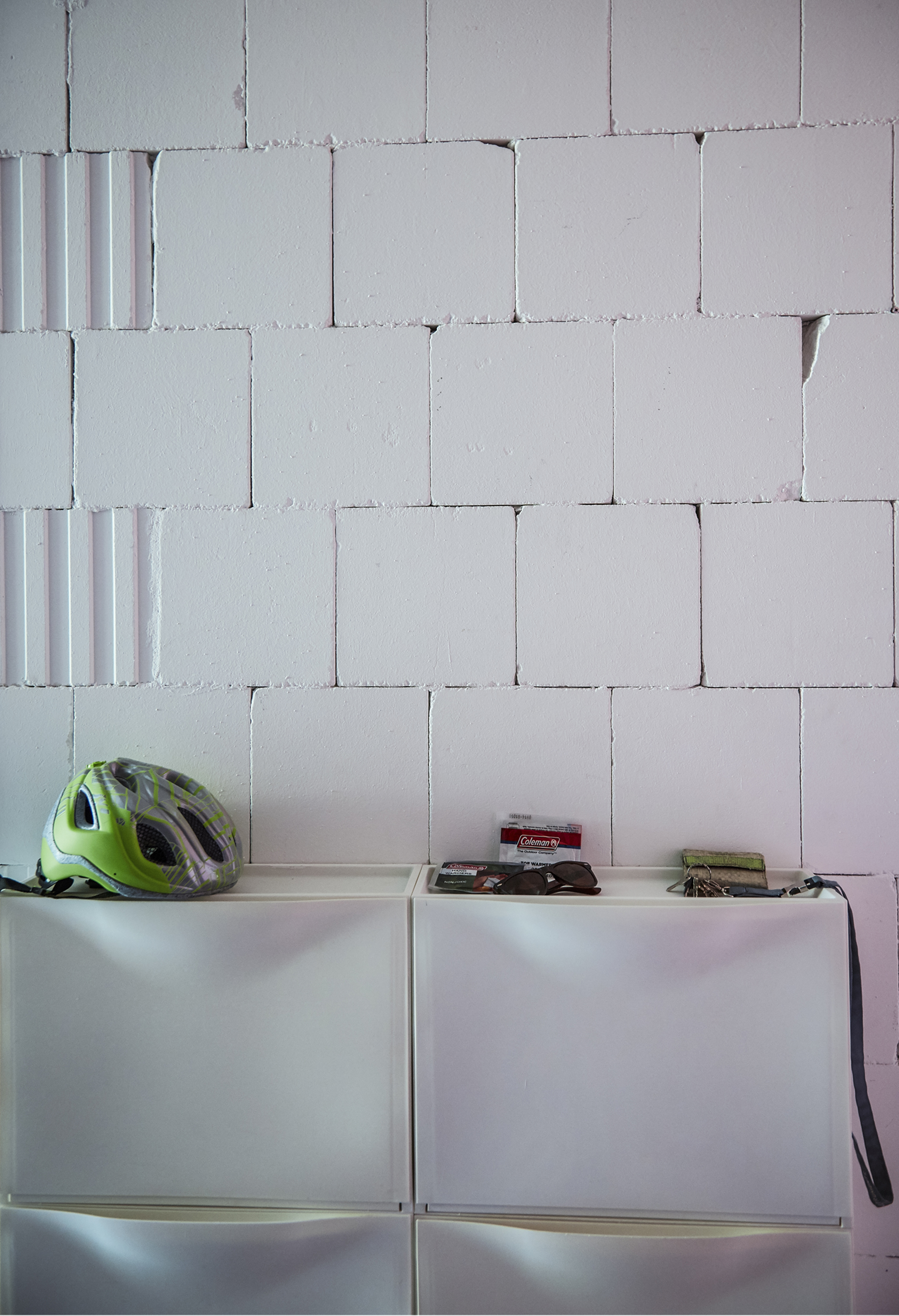 IKEA shoe cabinets on a white wall.