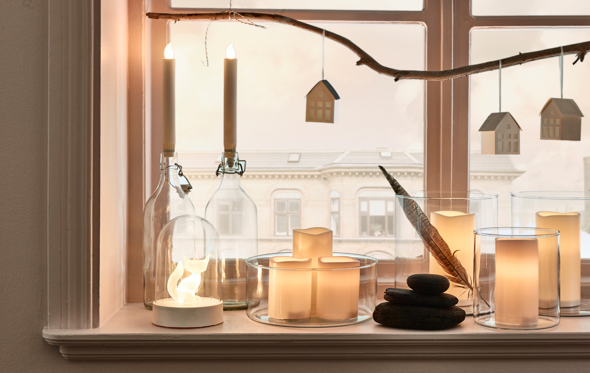 Looking for living room decoration ideas for the holidays? IKEA offers a lot of living room décor, such as LJUSANDE LED battery-operated candles or GODAFTON LED block candles, both in natural hues.