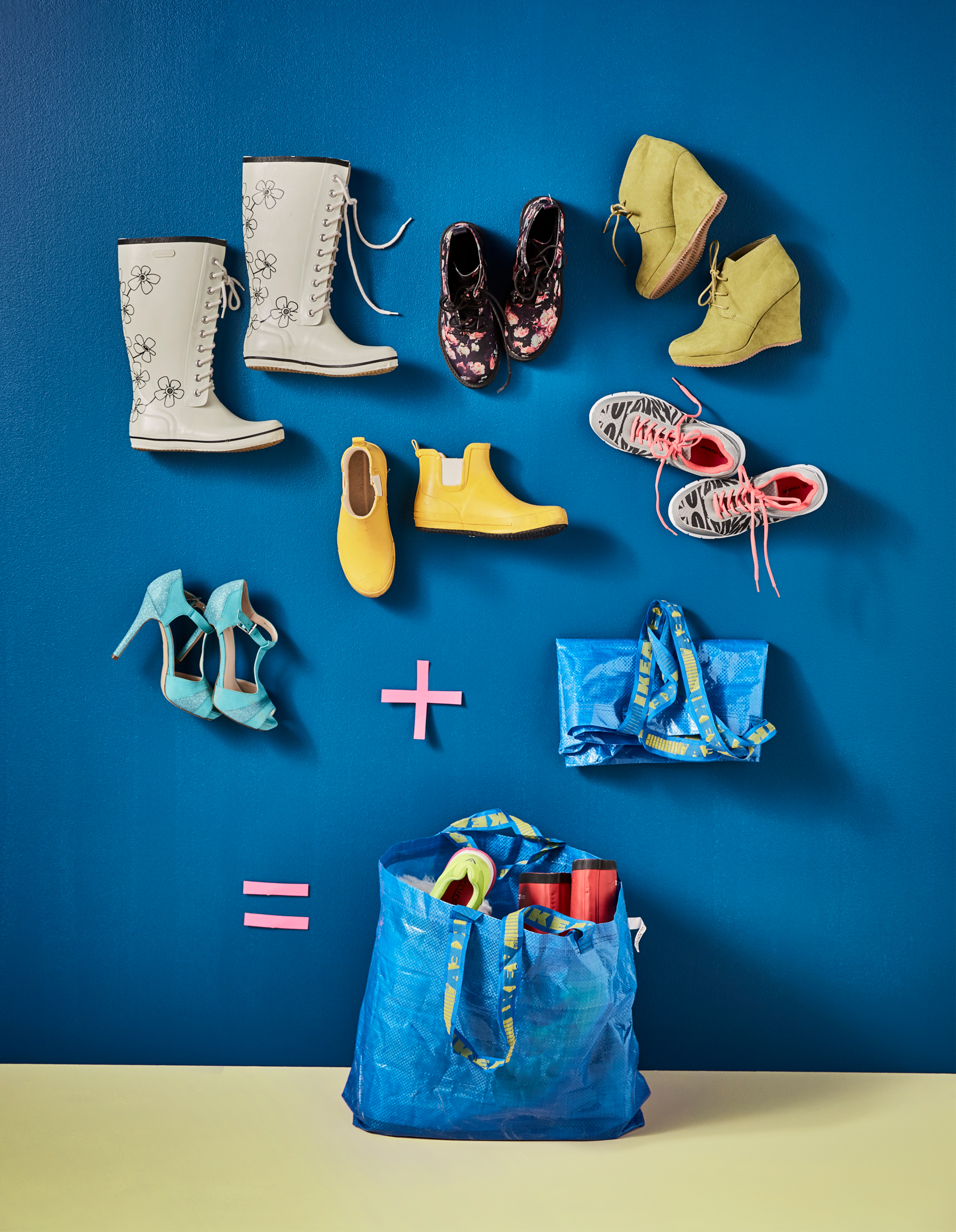 Shoes being packed into an IKEA blue bag
