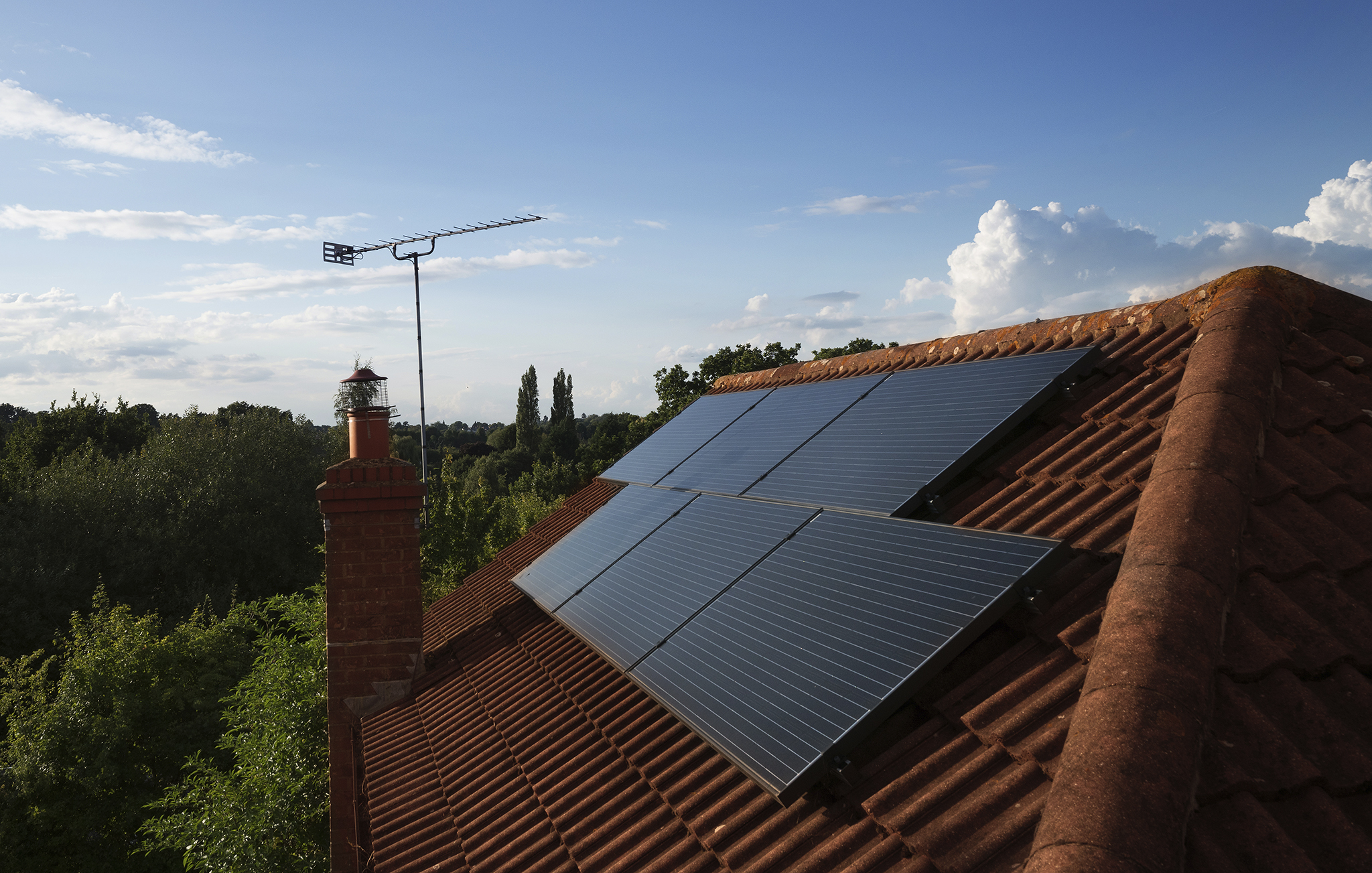 Solar panels mounted on the roof of a residential home.