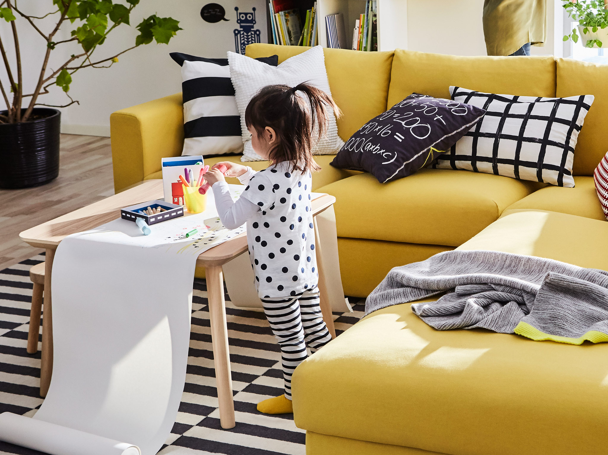 The yellow IKEA VIMLE three seat sofa brings lots of comfort and a little sunshine into your living room.